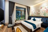 KunKin Garden Aparthotelにあるベッド