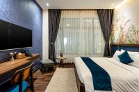KunKin Garden Aparthotelにあるベッド