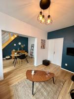 Televízia a/alebo spoločenská miestnosť v ubytovaní Duplex en plein cœur de Malo-Les-Bains