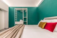 A bed or beds in a room at Ortigia's Queen