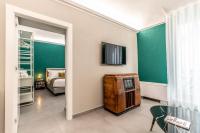 A television and/or entertainment centre at Ortigia's Queen