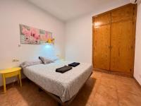 A bed or beds in a room at S2Plaza de la Merced especial grupos con parking