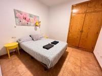 A bed or beds in a room at S2Plaza de la Merced especial grupos con parking