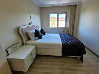Postel nebo postele na pokoji v ubytování Masif House