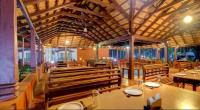 En restaurant eller et andet spisested på Lazo Areca Resort , Coorg