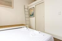 Łóżko lub łóżka w pokoju w obiekcie Appartement Gardague - 2 étoiles - Welkeys