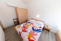 Łóżko lub łóżka w pokoju w obiekcie Guesthouse Villa Irena