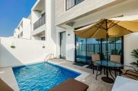 Bazén v ubytování Luxury Villas with Beach Access by VB Homes nebo v jeho okolí