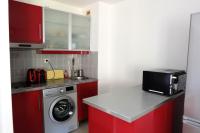 Kuchnia lub aneks kuchenny w obiekcie Petit paradis classé 3 étoiles à 200m de la plage! Terrasse-Wifi-Parking-clim