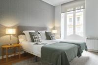 Posteľ alebo postele v izbe v ubytovaní Urbieta 3 by FeelFree Rentals