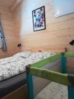 Łóżko lub łóżka w pokoju w obiekcie Ferienhaus-Eisenerz