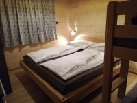 Łóżko lub łóżka w pokoju w obiekcie Ferienhaus-Eisenerz