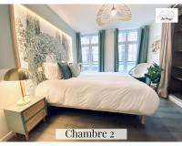 Posteľ alebo postele v izbe v ubytovaní Le 9 de Cœur - 2 chambres - 6 couchages