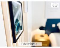 Televízia a/alebo spoločenská miestnosť v ubytovaní Le 9 de Cœur - 2 chambres - 6 couchages