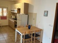 Kuchyň nebo kuchyňský kout v ubytování Apartments Milenka