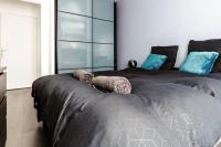 Posteľ alebo postele v izbe v ubytovaní Appartement confortable proche Disneyland Paris