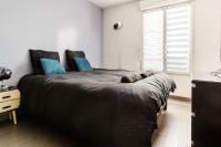 Posteľ alebo postele v izbe v ubytovaní Appartement confortable proche Disneyland Paris