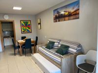 A seating area at Punta Prima 229