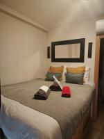 Posteľ alebo postele v izbe v ubytovaní Studio Miramar Suites Malaga