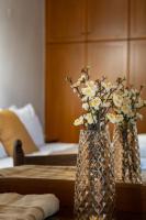A bed or beds in a room at Villa Eleftheria private pool/garden/view/3bdrms/3.5bthrms