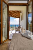 A balcony or terrace at Villa Eleftheria private pool/garden/view/3bdrms/3.5bthrms