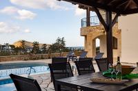 A balcony or terrace at Villa Eleftheria private pool/garden/view/3bdrms/3.5bthrms