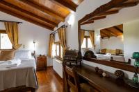 A bed or beds in a room at Villa Eleftheria private pool/garden/view/3bdrms/3.5bthrms