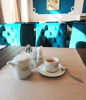 Příslušenství pro přípravu čaje a kávy v ubytování Hotel Maxim