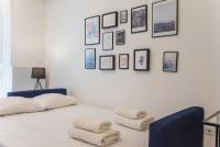 A bed or beds in a room at Speranza by halu! Apartment next to Efkleidis metro station