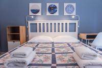A bed or beds in a room at Speranza by halu! Apartment next to Efkleidis metro station