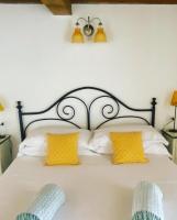 A bed or beds in a room at Il Mulino di Hotel Villa Aurora