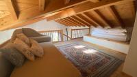 A bed or beds in a room at Il Mulino di Hotel Villa Aurora
