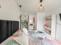 Posteľ alebo postele v izbe v ubytovaní Cosy Appartement T2 proche Paris