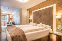 Posteľ alebo postele v izbe v ubytovaní Hotel Jägerheim 3S