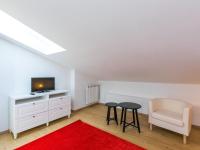 Televízia a/alebo spoločenská miestnosť v ubytovaní Holiday Home Melograno-2 by Interhome