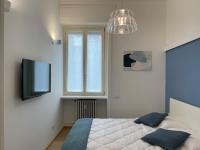 A bed or beds in a room at Dimora Dei Cappuccini