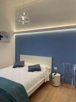 A bed or beds in a room at Dimora Dei Cappuccini