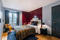 Postel nebo postele na pokoji v ubytování Stylish 4 suites +patio luxury apartment Gran Via