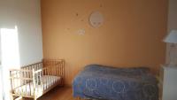 Łóżko lub łóżka w pokoju w obiekcie Maison Béthanie