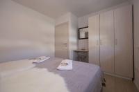 Una cama o camas en una habitaci&oacute;n de Apartment Kokolo