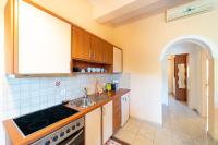 A kitchen or kitchenette at Villa Marina
