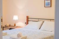 A bed or beds in a room at Villa Marina