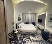 MD Hotel By Gewanにあるテレビまたはエンターテインメントセンター