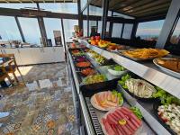 a buffet line with many different types of food at Anthemis Hotel in Istanbul