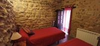 Posteľ alebo postele v izbe v ubytovaní Casa Rural Mirador de la Torre