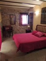 Posteľ alebo postele v izbe v ubytovaní Casa Rural Mirador de la Torre