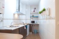 A kitchen or kitchenette at Apartamentos Catedral Plaza 3000