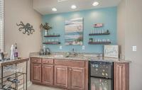 eine Küche mit Spüle und Arbeitsplatte in der Unterkunft Stunning Ocean Breeze Luxury Villas 4D-Across The Street From The Ocean! Sleeps 10 guests! in Myrtle Beach