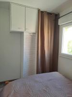 Posteľ alebo postele v izbe v ubytovaní Coquet T2, Vue sur mer