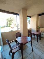 Posedenie v ubytovaní APARTAMENTO DOS DORMITORIOS BAJO, VISTAS PISCINA